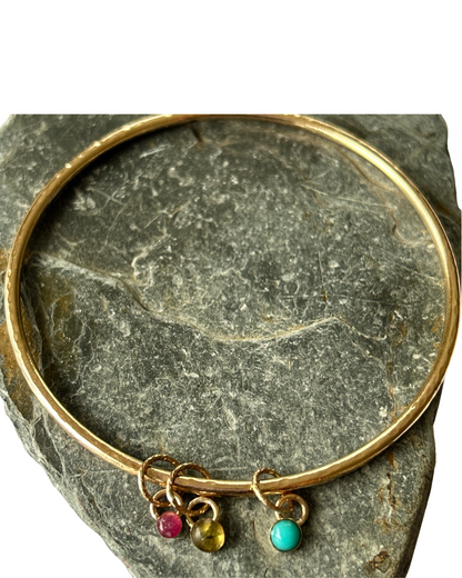 Gold Bangle With Gemstone Charms